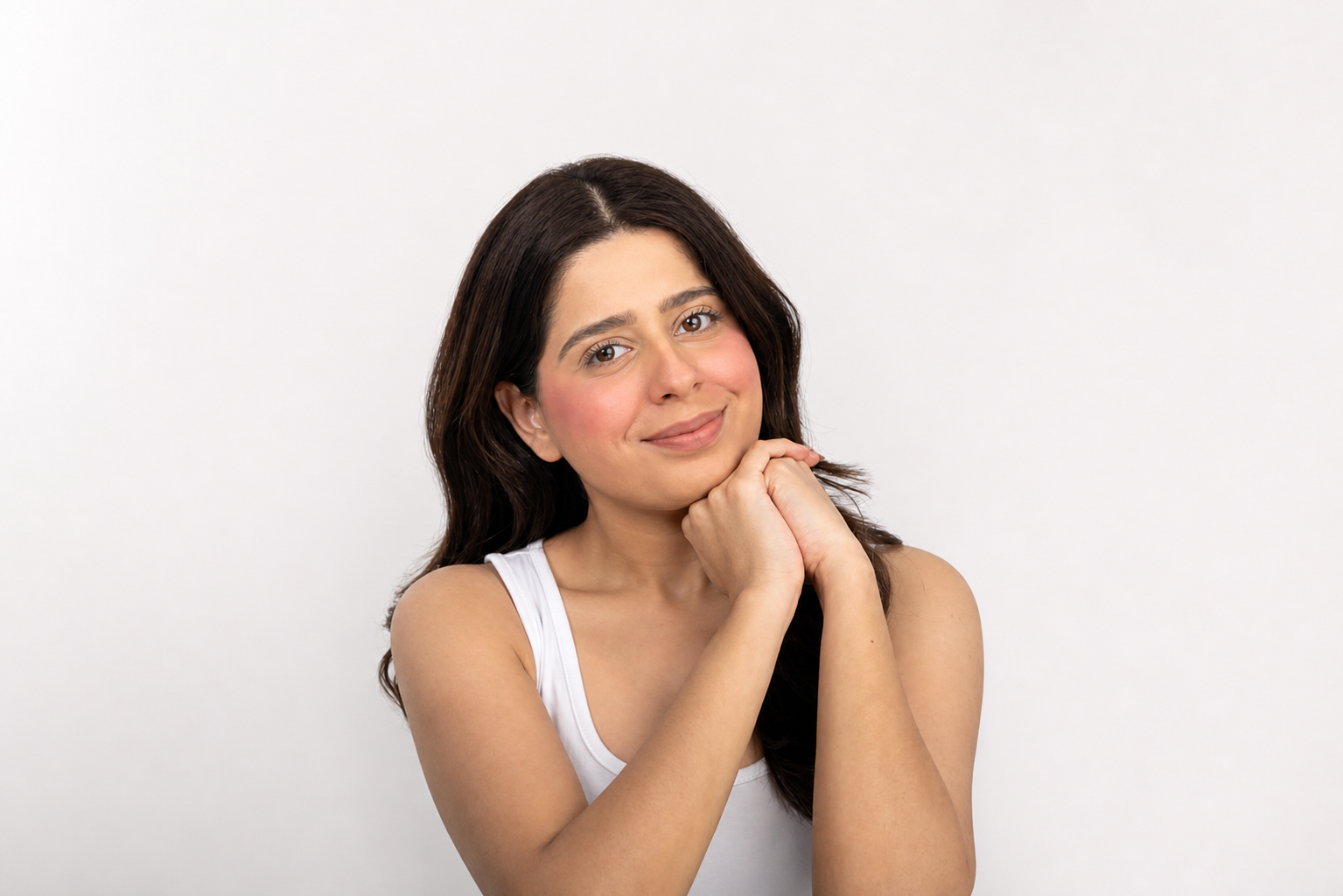Vikar Beauty model wearing a luminous blush